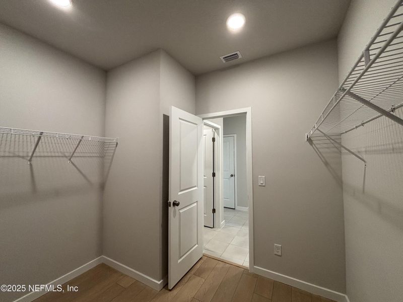 Spacious, unfurnished interior of a new home in The Magnolia Series at Reserve East, Flagler Beach (Image 27).