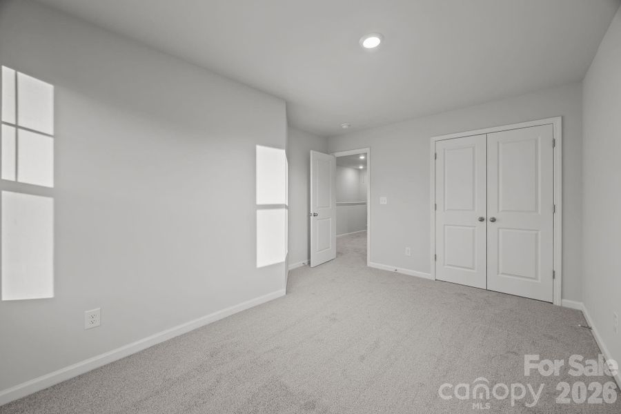 Spacious, unfurnished interior of a new home in Townes at Ribbon Walk, Charlotte (Image 13).