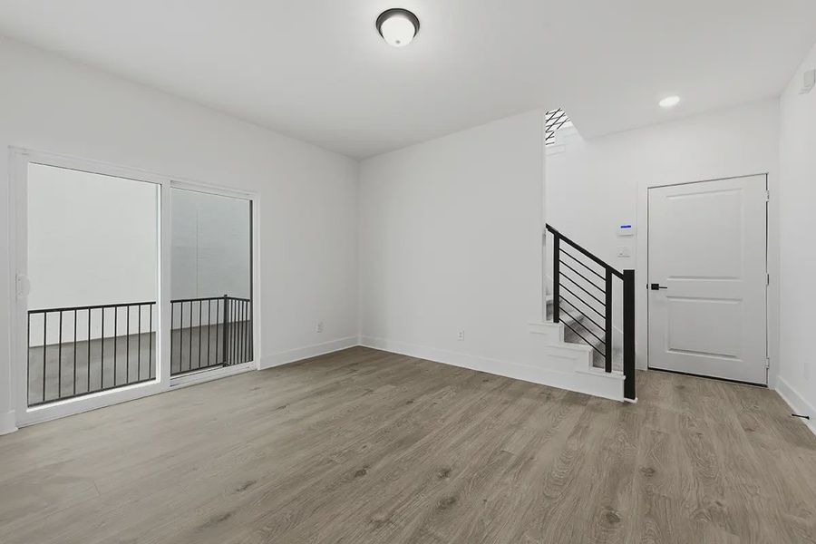 Spacious, unfurnished interior of a new home in Centero at Stone Oak, San Antonio (Image 19).