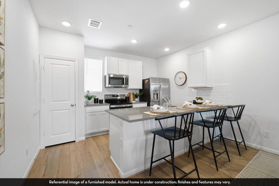 Furnished interior view inside a new home in Municipal Drive Townhomes, Leander (Image 9).