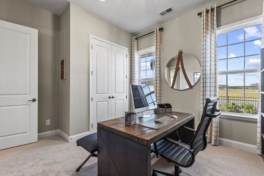 Representative furnished interior of a home built from the Presley by Taylor Morrison in River Falls, Tega Cay (Image 8).