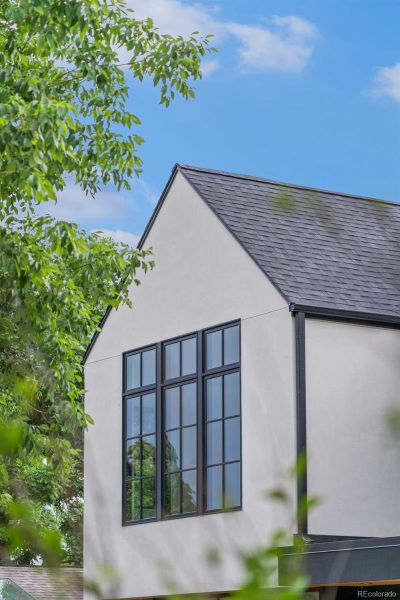 Front exterior of a new home in , Denver, CO, highlighting curb appeal (Image 27).