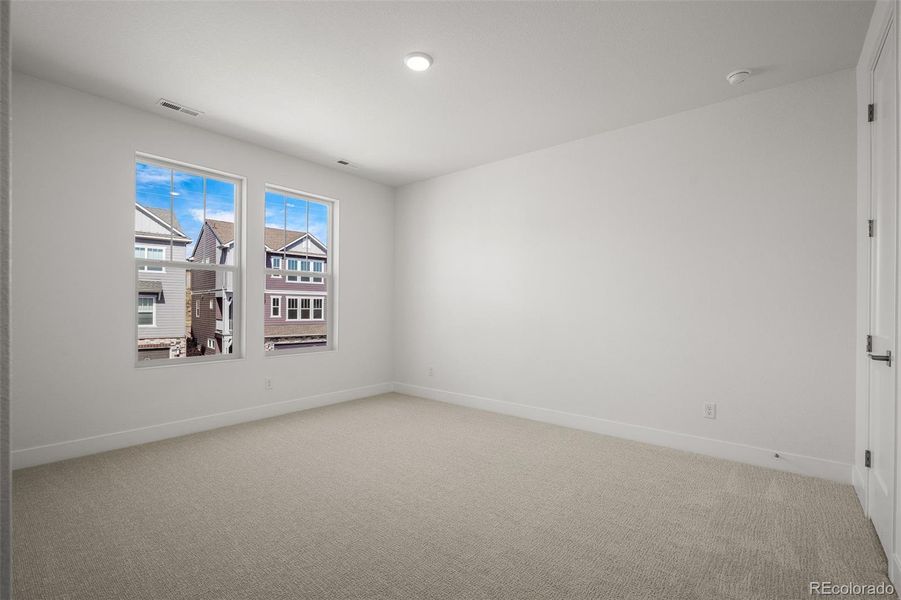 Spacious, unfurnished interior of a new home in Trailside at Cottonwood Creek, Colorado Springs (Image 33).