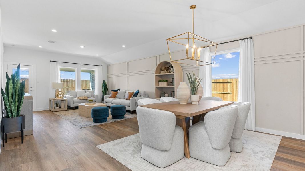 Furnished interior view inside a new home in Caldwell Crossing, Iowa Colony (Image 7).