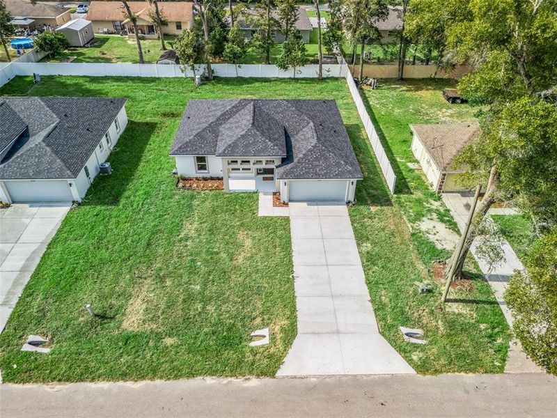 Front exterior of a new home in , Ocala, FL, highlighting curb appeal (Image 22).