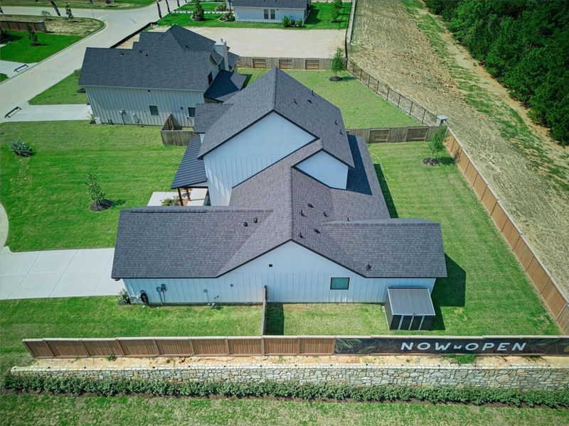 Front exterior of a new home in Magnolia Woods - 70', Magnolia, TX, highlighting curb appeal (Image 23).