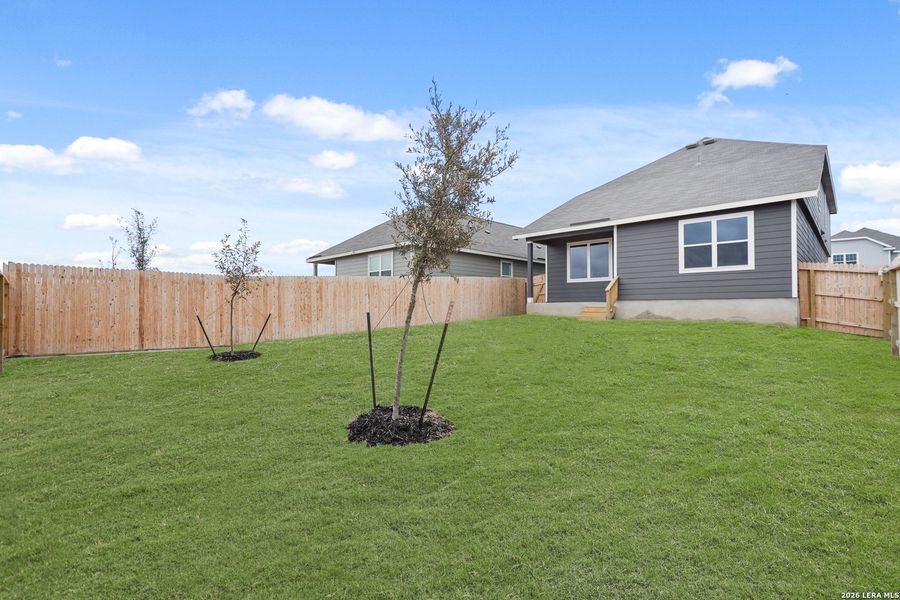 Exterior details and patio area of a home in Abbott Place, St. Hedwig (Image 4).