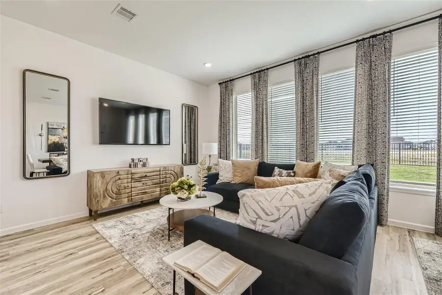 Furnished interior view inside a new home in Bridgeland, Cypress (Image 16).