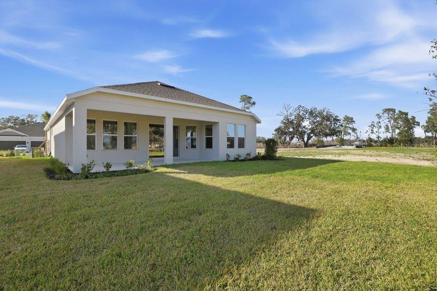 Exterior details and patio area of a home in Timber Ridge, Plant City (Image 18).