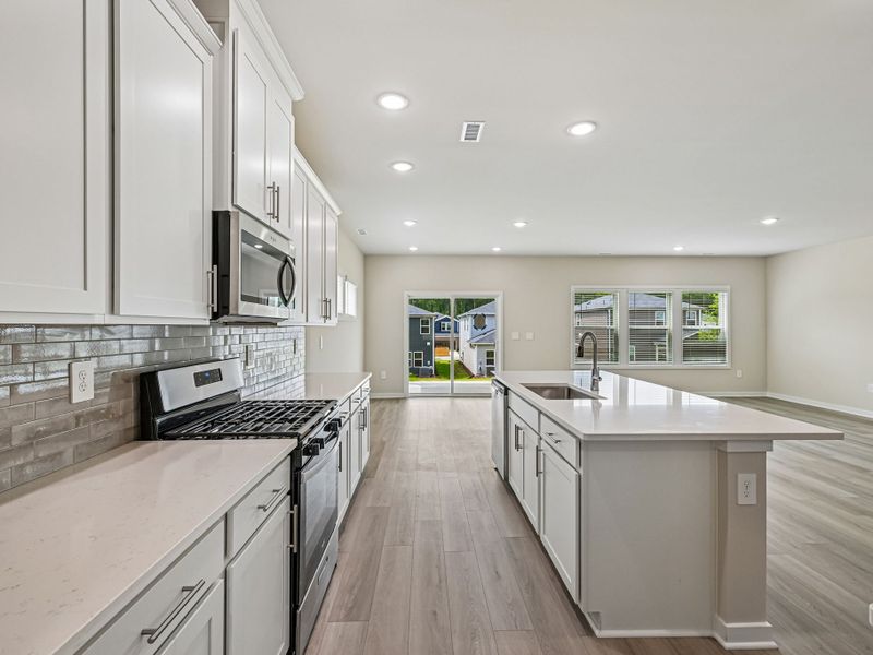 Furnished interior view inside a new home in Avalon Place - Signature Series, Durham (Image 5).