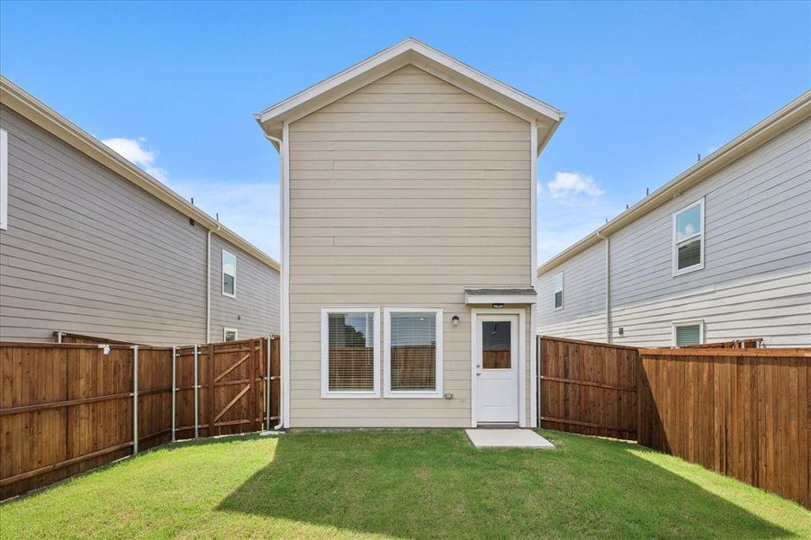 Exterior details and patio area of a home in Foree Ranch: Wellton Collection, Providence Village (Image 3).