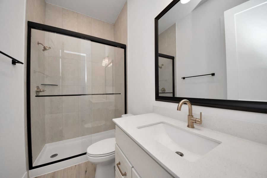 Furnished interior view inside a new home in Meridiana Courtyard Collection, Manvel (Image 18).
