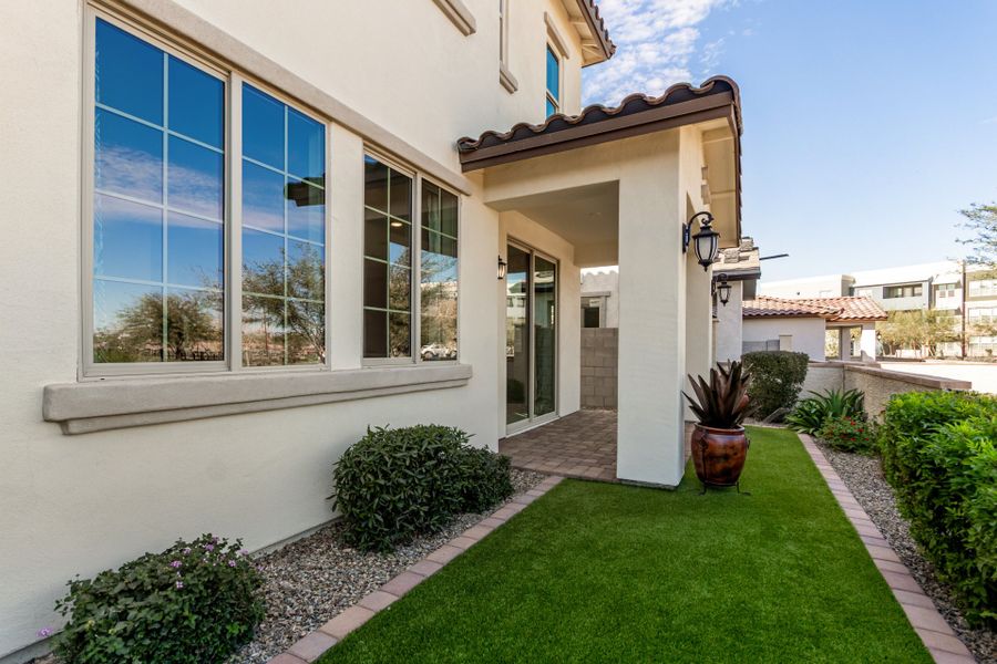 Exterior details and patio area of a home in Eastmark, Mesa (Image 3).