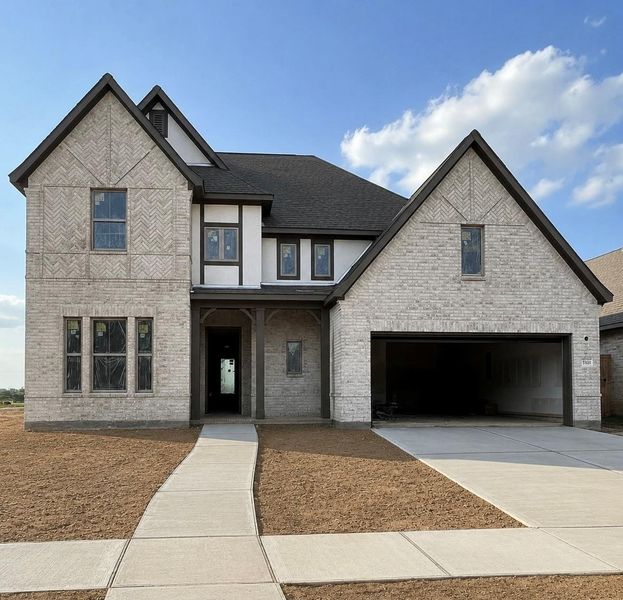 Front exterior of a new home in Jubilee, Hockley, TX, highlighting curb appeal (Image 2). Front exterior of a new home in Jubilee, Hockley, TX, highlighting curb appeal (Image 2).