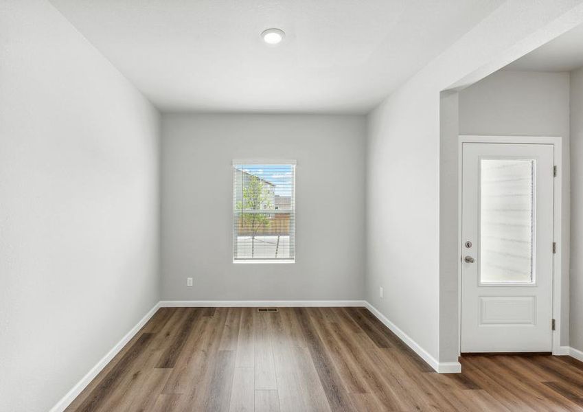 The dining room of the Arapaho plan has a window that lets in great, natural light.