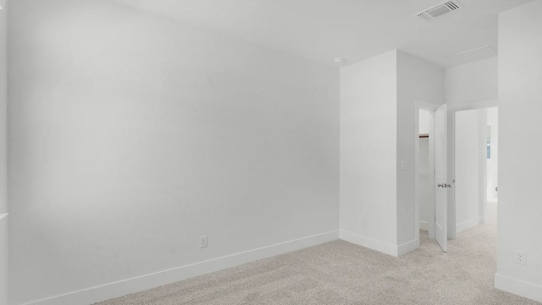 Representative unfurnished interior of a home built from the Archer by Chesmar Homes in Santa Rita Ranch, Liberty Hill (Image 20).