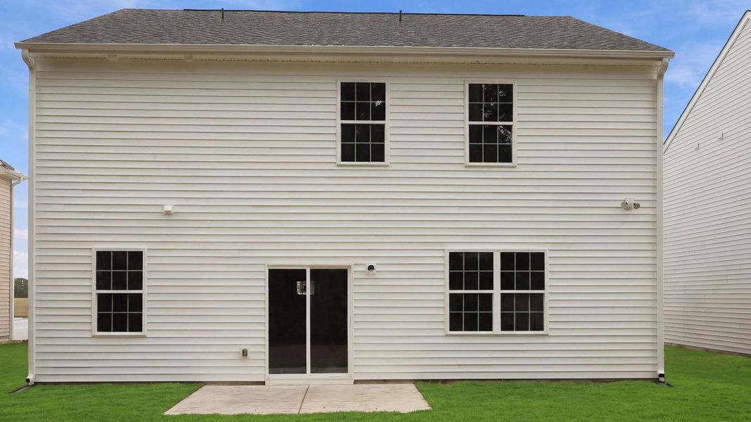 Exterior details and patio area of a home in Ridgewood Farms, Winterville (Image 17).