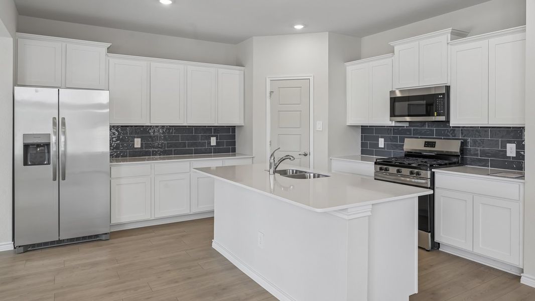 Furnished interior view inside a new home in Lilybrooke at Legacy Hills, Celina (Image 6).
