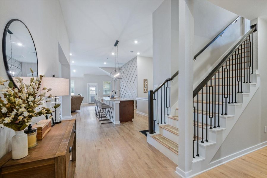 Entry, stairs to the media room with full bathroom