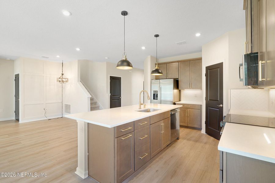 Furnished interior view inside a new home in Seminole Palms Single-Family Homes, Palm Coast (Image 9).
