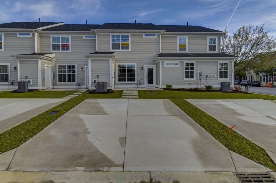 Front exterior of a new home in Lake Carolina Townhomes, Columbia, SC, highlighting curb appeal (Image 25).