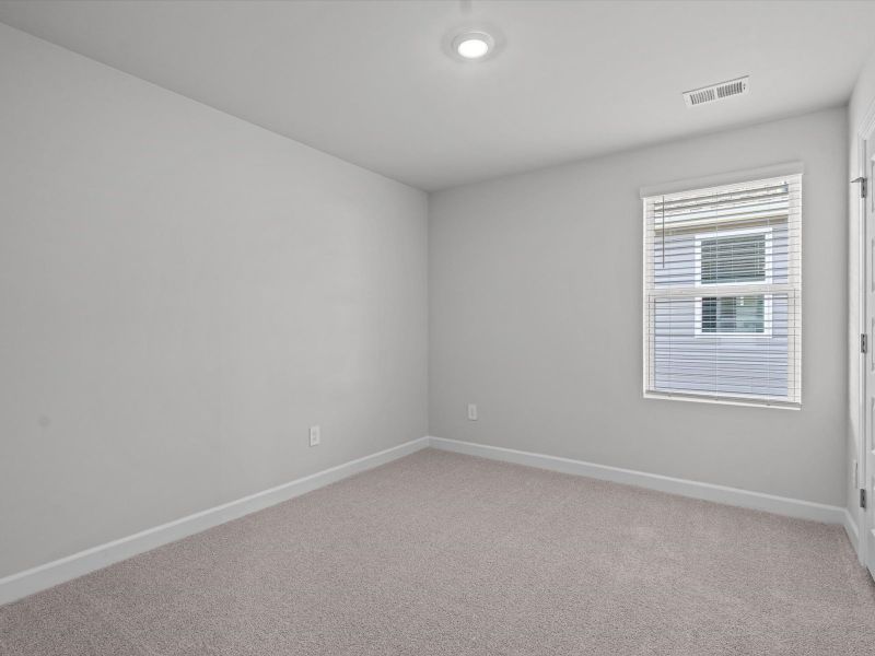 Spacious, unfurnished interior of a new home in Brayfield Manor - Heritage Collection, Wellford (Image 18).