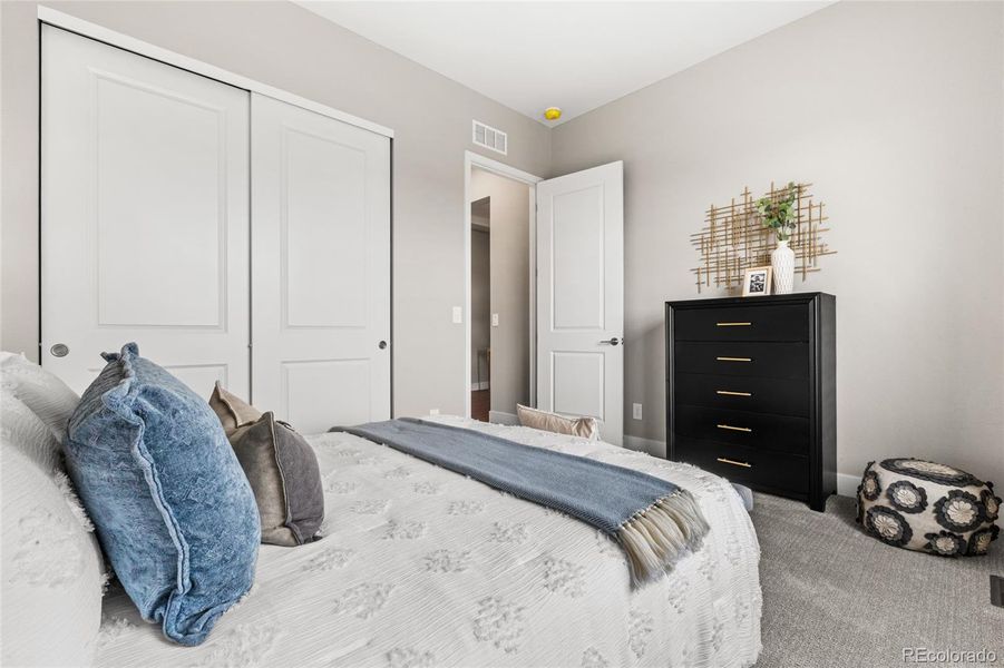 Furnished interior view inside a new home in Hilltop at Inspiration, Aurora (Image 18).