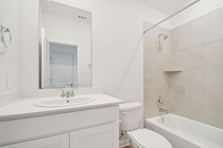 Furnished interior view inside a new home in , Conroe (Image 6).
