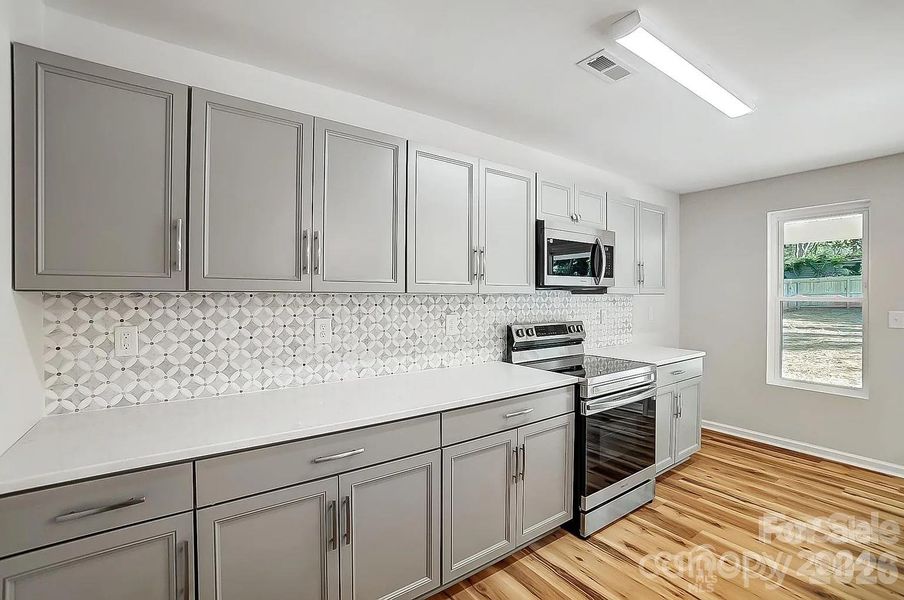 Furnished interior view inside a new home in , Charlotte (Image 4).