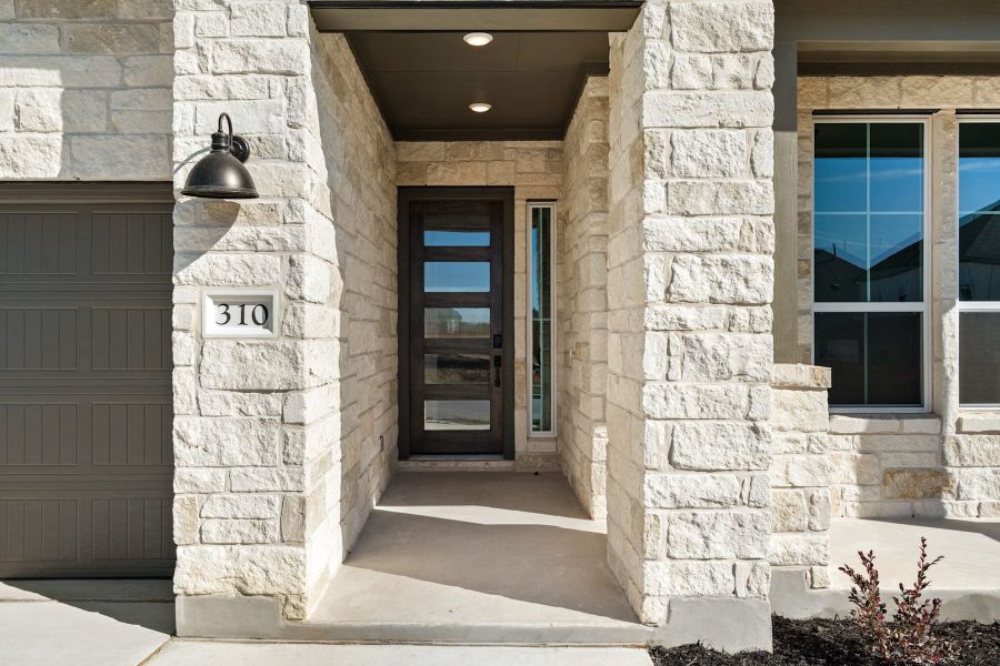 Exterior details and patio area of a home in Heritage, Dripping Springs (Image 3). Exterior details and patio area of a home in Heritage, Dripping Springs (Image 3).
