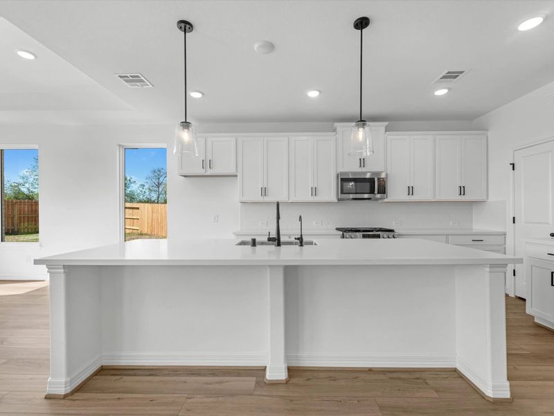 Kitchen. Sample product photo. Actual exterior and interior selections may vary by homesite. Photo may be virtually staged.