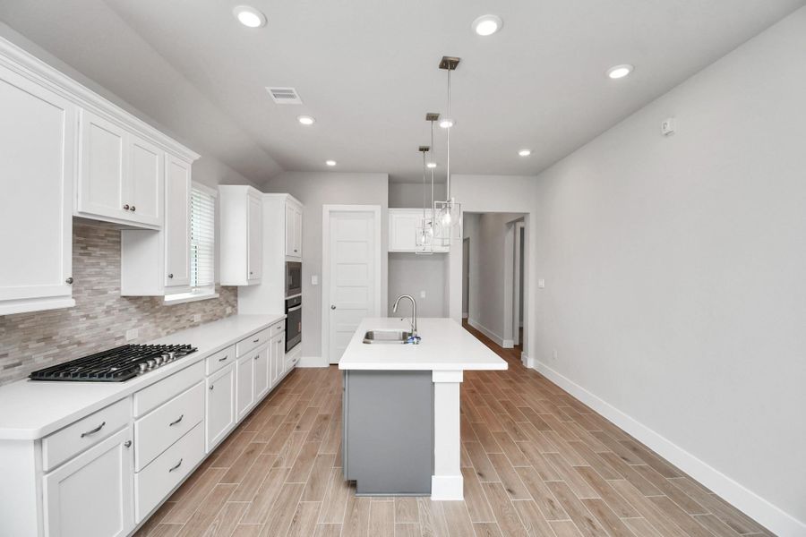Furnished interior view inside a new home in Arabella on the Prairie: Signature Collection, Richmond (Image 6).