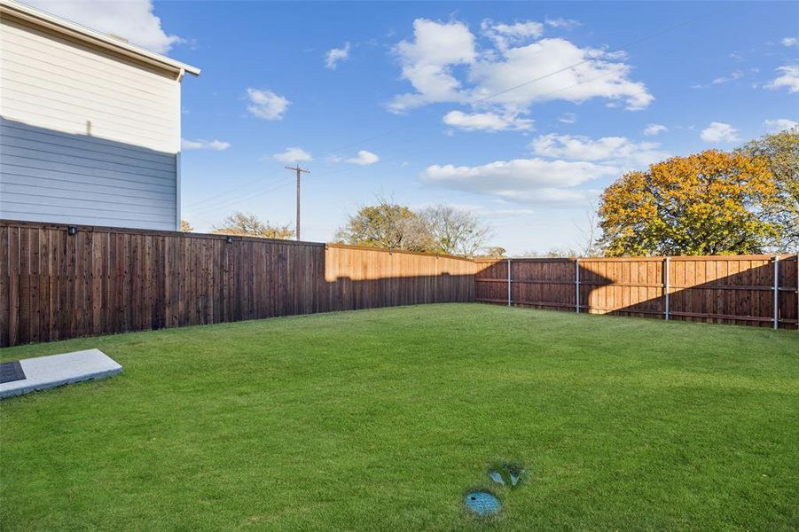 Exterior details and patio area of a home in Foree Ranch: Wellton Collection, Providence Village (Image 4). Exterior details and patio area of a home in Foree Ranch: Wellton Collection, Providence Village (Image 4).