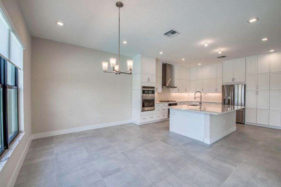 Furnished interior view inside a new home in Apex at Avenir, Palm Beach Gardens (Image 9). Furnished interior view inside a new home in Apex at Avenir, Palm Beach Gardens (Image 9).
