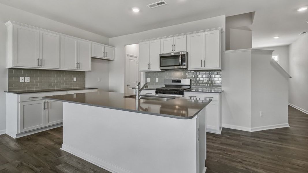 Furnished interior view inside a new home in Chapel Townes, Raleigh (Image 5). Furnished interior view inside a new home in Chapel Townes, Raleigh (Image 5).