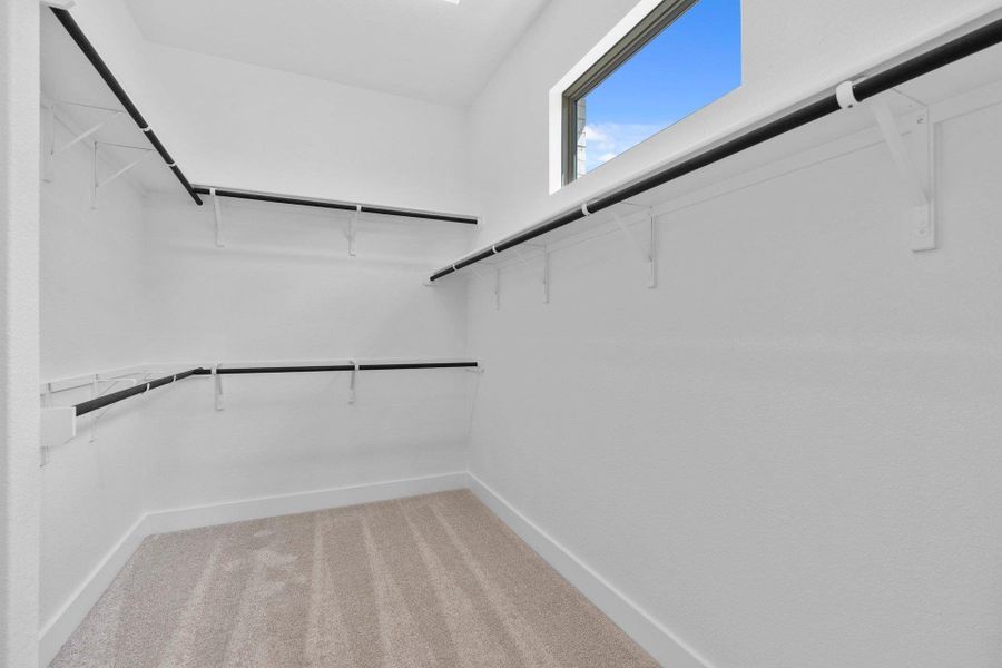 Walk-in closet in Primary Bedroom