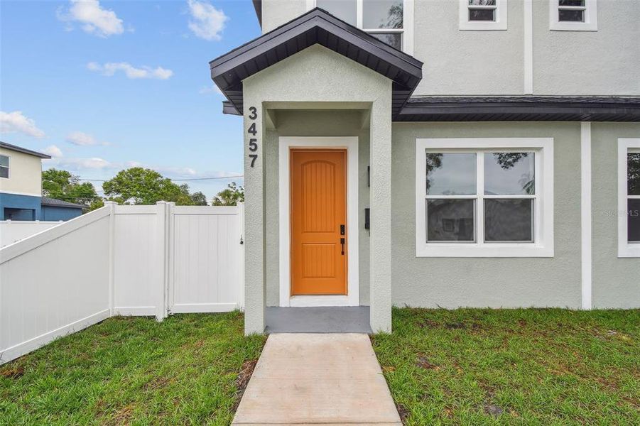 Front exterior of a new home in , St. Petersburg, FL, highlighting curb appeal (Image 1). Front exterior of a new home in , St. Petersburg, FL, highlighting curb appeal (Image 1).