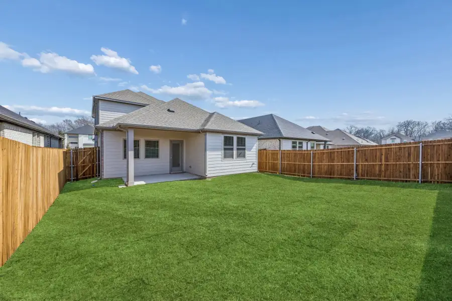 Covered Patio in the Willow home plan by Trophy Signature Homes – REPRESENTATIVE PHOTO Covered Patio in the Willow home plan by Trophy Signature Homes – REPRESENTATIVE PHOTO
