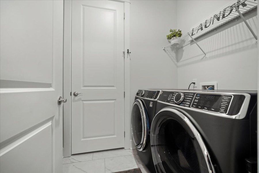 Furnished interior view inside a new home in K. Hovnanian's® Four Seasons at Lakes of Cane Bay, Summerville (Image 5).