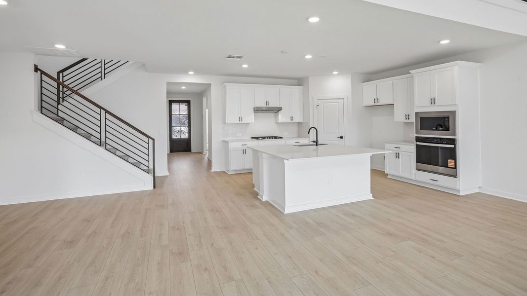 Furnished interior view inside a new home in Rosenbusch Ranch, Leander (Image 6).
