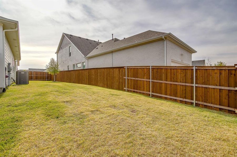 Exterior details and patio area of a home in Walsh, Fort Worth (Image 28). Exterior details and patio area of a home in Walsh, Fort Worth (Image 28).