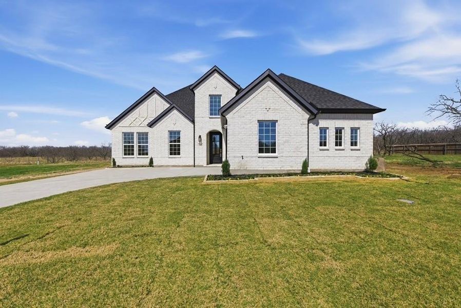 Front exterior of a new home in , Sherman, TX, highlighting curb appeal (Image 24).