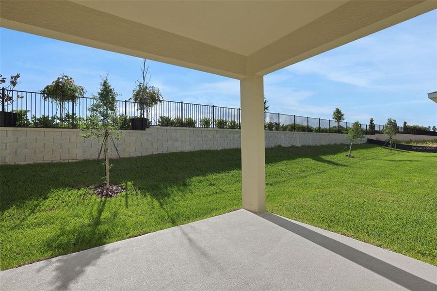 Exterior details and patio area of a home in Seaport Village, Tavares (Image 4).