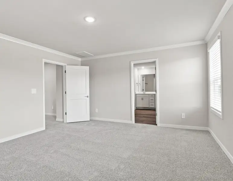 Spacious, unfurnished interior of a new home in Country Lane - Classic Series, Clayton (Image 15).