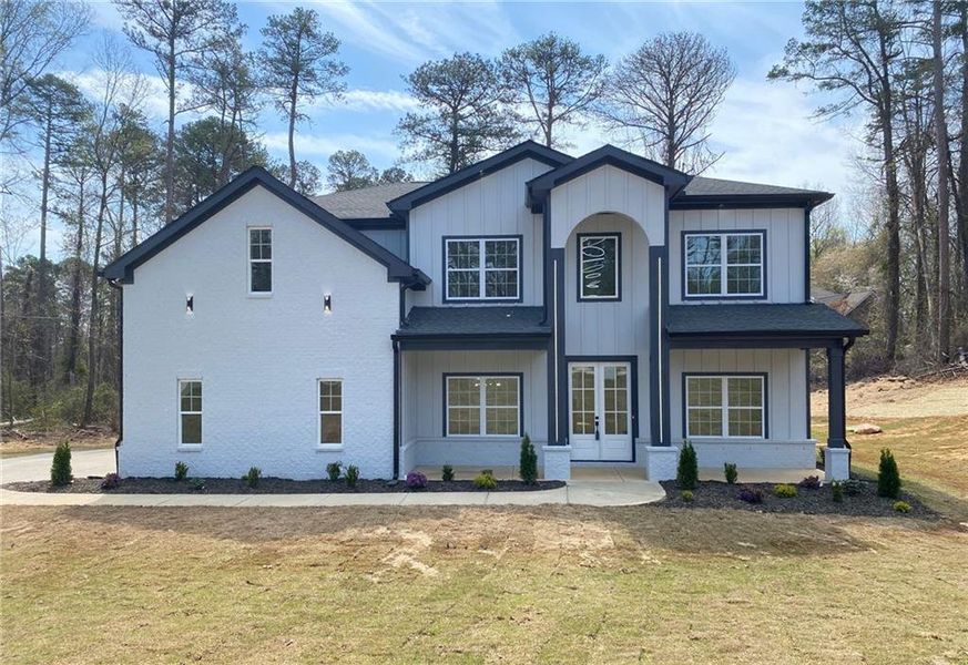 Front exterior of a new home in , Snellville, GA, highlighting curb appeal (Image 30).