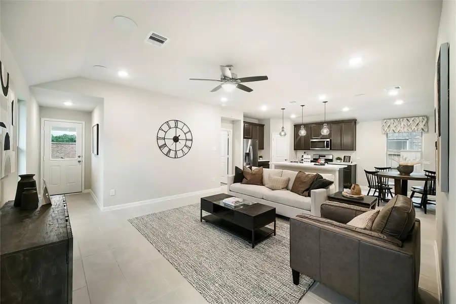 Sample photo of completed home with similar floor plan. As-built color and selections may vary.