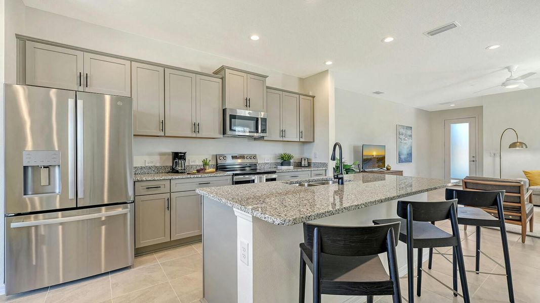 Furnished interior view inside a new home in Grand Park Real Estate and Homes for Sale in Sarasota, FL - Neal Communities, Sarasota (Image 16).