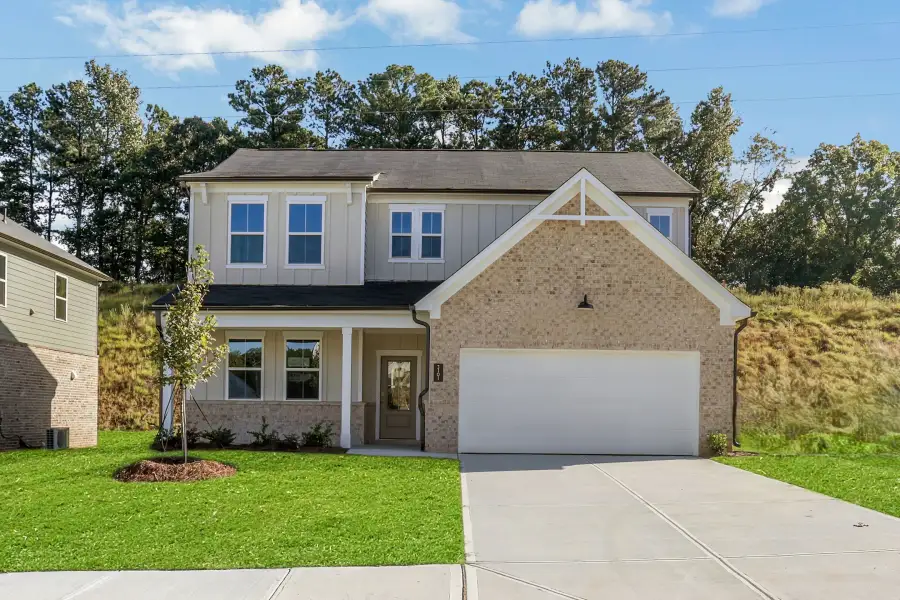 Front exterior of a new home in Easton Walk, Lawrenceville, GA, highlighting curb appeal (Image 1). Front exterior of a new home in Easton Walk, Lawrenceville, GA, highlighting curb appeal (Image 1).