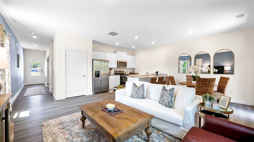 Representative furnished interior of a home built from the Mitchell Townhome by D.R. Horton in Belcourt Landing, Cleveland (Image 7).