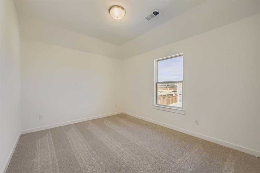 Unfurnished room with light carpet Unfurnished room with light carpet